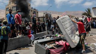 Fiscalía de Chile ordena investigación por violenta protesta contra migrantes venezolanos en Iquique 