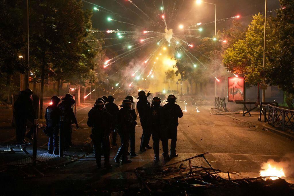 Police trying to control riots at the Cite Pablo Picasso in Nanterre, northwest of Paris.  (GETTY IMAGES).