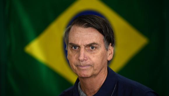 Algunos partidarios de Jair Bolsonaro le pidieron que moderara su mensaje para asegurar la victoria, pero el candidato dijo que mantendría el tono duro que ha empleado para referirse al crimen y la corrupción. (AFP)