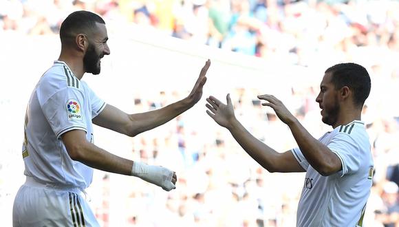 Benzema celebra con Harzard su gol frente al Granada, que fue el 1-0 del Real Madrid. (Foto: AFP / PIERRE-PHILIPPE MARCOU)