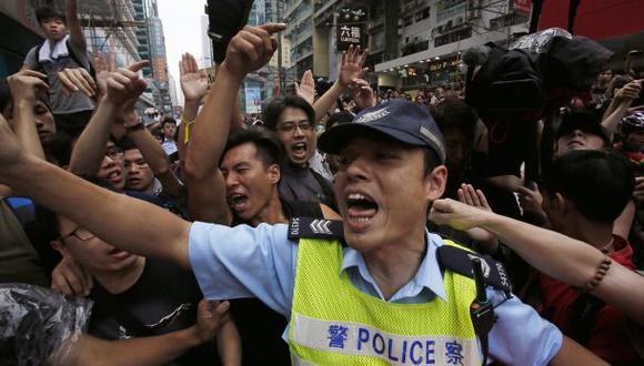 Manifestantes de Hong Kong anuncian su retiro de algunas zonas