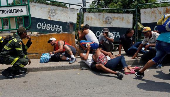 El 3 de mayo, justo al lado del fronterizo puente Simón Bolívar se registró una balacera entre delincuentes que controlan las trochas, dejando como saldo un muerto y un herido. Foto: Luisa González / Reuters, vía El Tiempo