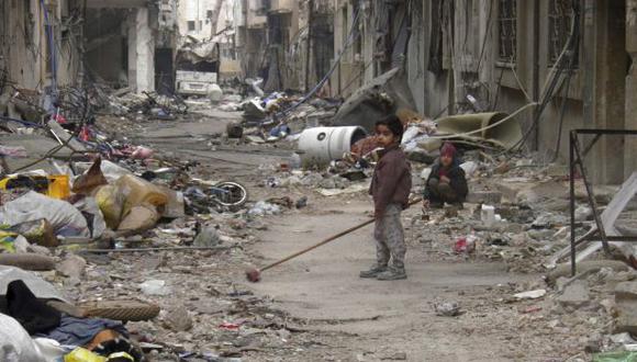 Mujeres y niños podrán salir de devastada ciudad siria de Homs