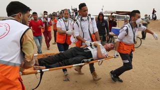 Gaza: Casi 100 palestinos heridos por el ejército israelí en protesta [FOTOS]