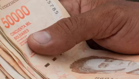 DólarToday hoy, viernes 14 de abril: Consulta el tipo de cambio del dólar en compra y venta en Venezuela | (Foto: AFP / Referencial) (Foto: AP /Ariana Cubillos, archivo)