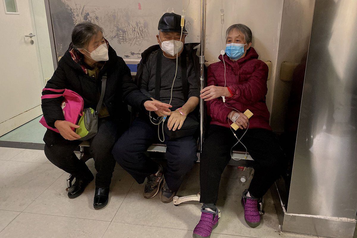 This image shows covid-19 patients receiving treatment at the Tianjin First Center Hospital in Tianjin on December 28, 2022. (Photo by Noel Celis / AFP)
