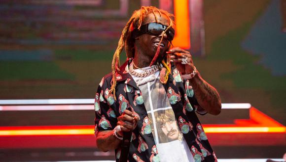 Lil Wayne decidió declararse culpable luego que le encontraran un arma en su equipaje. (Foto: Suzanne Cordeiro / AFP)