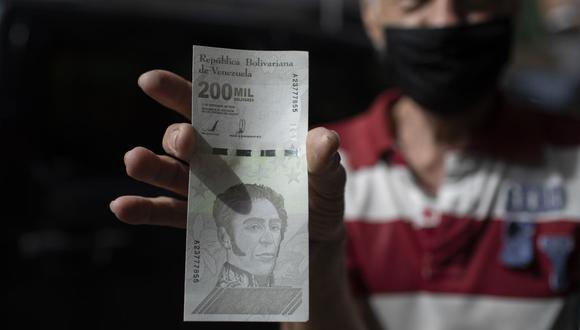 Sepa aquí a cuánto se cotiza el dólar en Venezuela este 6 de abril de 2021. (Foto: AP)