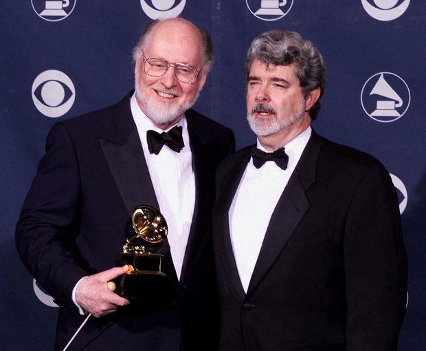 George Lucas (right) poses next to John Williams at the 1999 Grammy Award ceremony where the composer won the trophy for Best Soundtrack Album for Visual Media for his work on "Saving Private Ryan" (Photo: VINCE BUCCI / AFP)