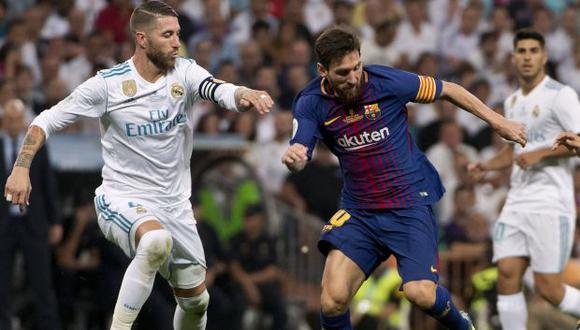 Sergio Ramos y Lionel Messi, futbolistas de la Liga española. (Foto: AFP)