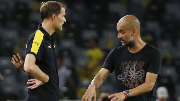 Pep Guardiola y Thomas Tuchel conversando tras un Bayern-Dortmund. (Foto: AP)
