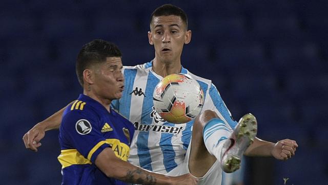 Boca Juniors' Colombian Jorman Campuzano (L) and Racing Club's Matias Rojas vie for the ball during their Copa Libertadores all-Argentine quarterfinal football match at La Bombonera stadium in Buenos Aires on December 23, 2020. (Photo by Juan Mabromata / POOL / AFP)