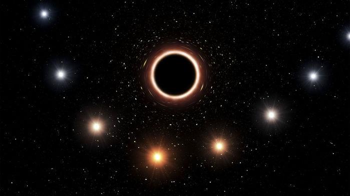 Una impresión artística de la estrella 'S2' pasando cerca del agujero negro supermasivo en el centro de la Vía Láctea. (Foto: M. KORNMESSER/ESO)