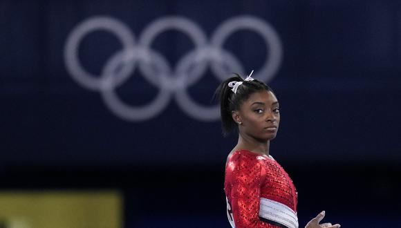 Simone Biles, of the United States, waits to perform on the vault during the artistic gymnastics women's final at the 2020 Summer Olympics, Tuesday, July 27, 2021, in Tokyo. (AP Photo/Gregory Bull)