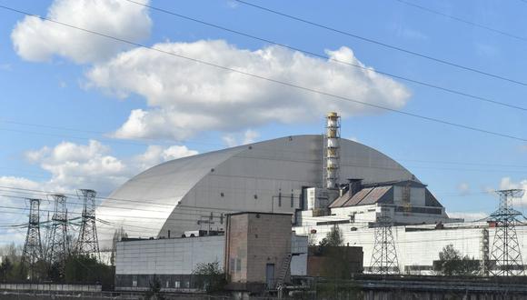 Una vista general muestra la nueva cúpula protectora de Chernobyl de 108 metros el 23 de abril de 2018. (Serguéi SUPINSKY / AFP).