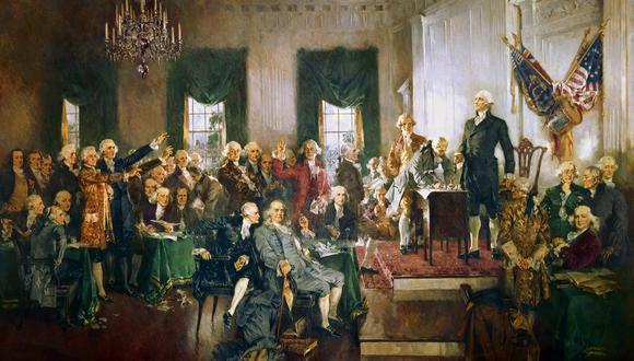 Una pintura de 1940 que representa la firma de la Constitución de Estados Unidos con George Washington, Benjamin Franklin y Alexander Hamilton, el 4 de marzo de 1789. (Artista: Howard Chandler Christy)