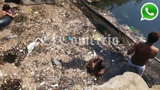 WhatsApp: niños nadan en laguna llena de basura en Huacho
