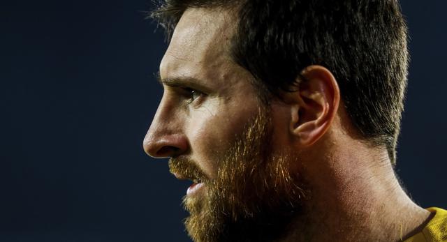 Messi arengó a sus compañeros. (Foto: AFP)