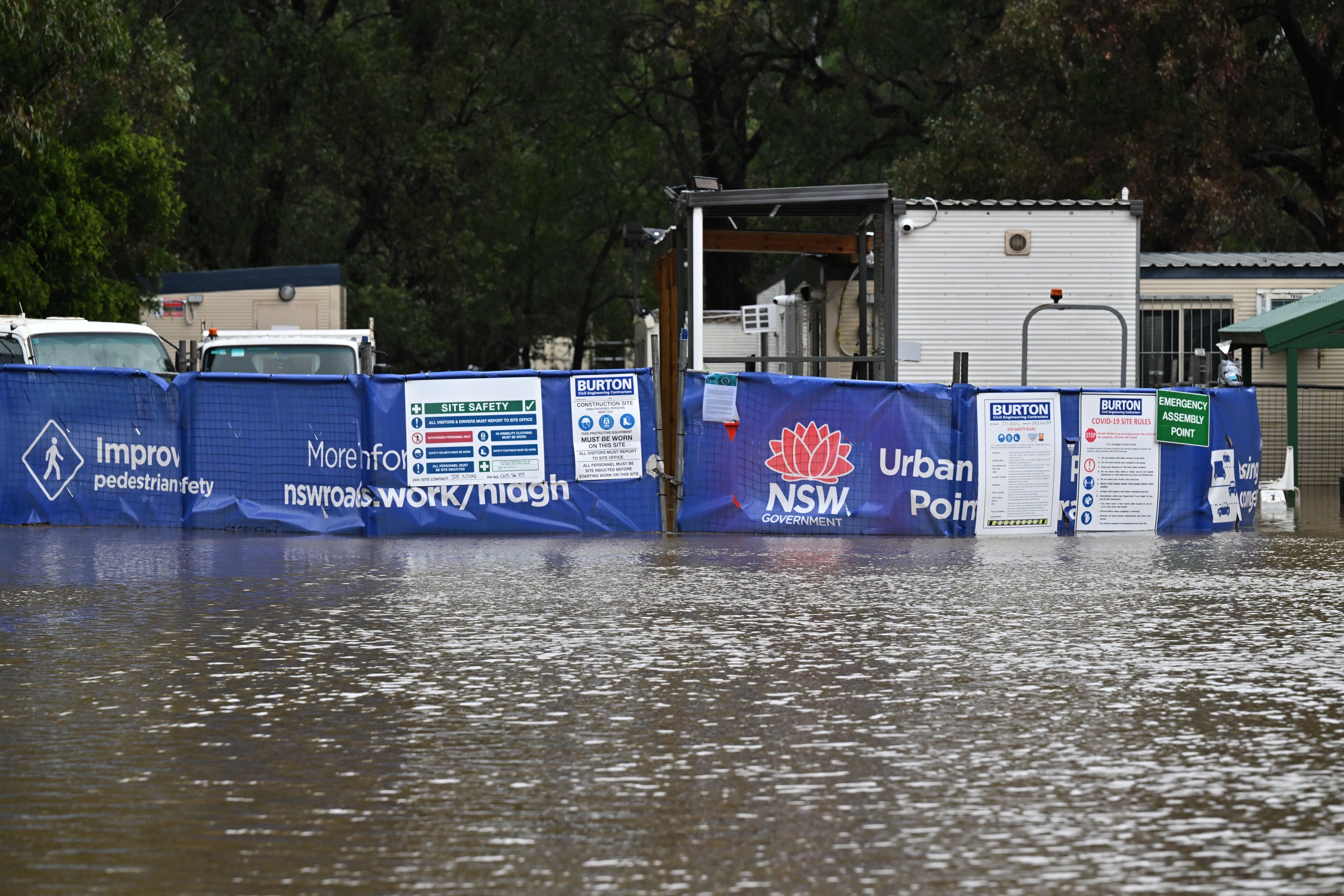 A work site is seen in the flooding in Lansvale in western Sydney, Australia.