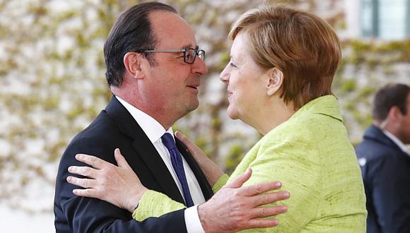 Hollande y Merkel se despiden celebrando su amistad