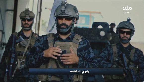 Un video tomado de la televisión afgana RTA muestra a las Fuerzas Especiales Badri 313 de los talibanes patrullando las calles en un lugar no identificado en Afganistán. (RTA TV / AFP).