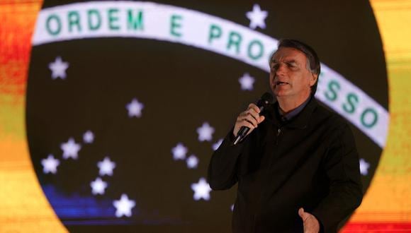 El presidente de Brasil, Jair Bolsonaro, pronuncia un discurso en el evento 'Mujeres por la vida y la familia' organizado por el Partido Liberal-Mujeres, en Novo Hamburgo, estado de Rio Grande do Sul, Brasil, el 3 de septiembre de 2022. (Foto de SILVIO AVILA / AFP)