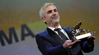 Mi filme "habla de gente invisible", confiesa Alfonso Cuarón tras triunfar en Venecia