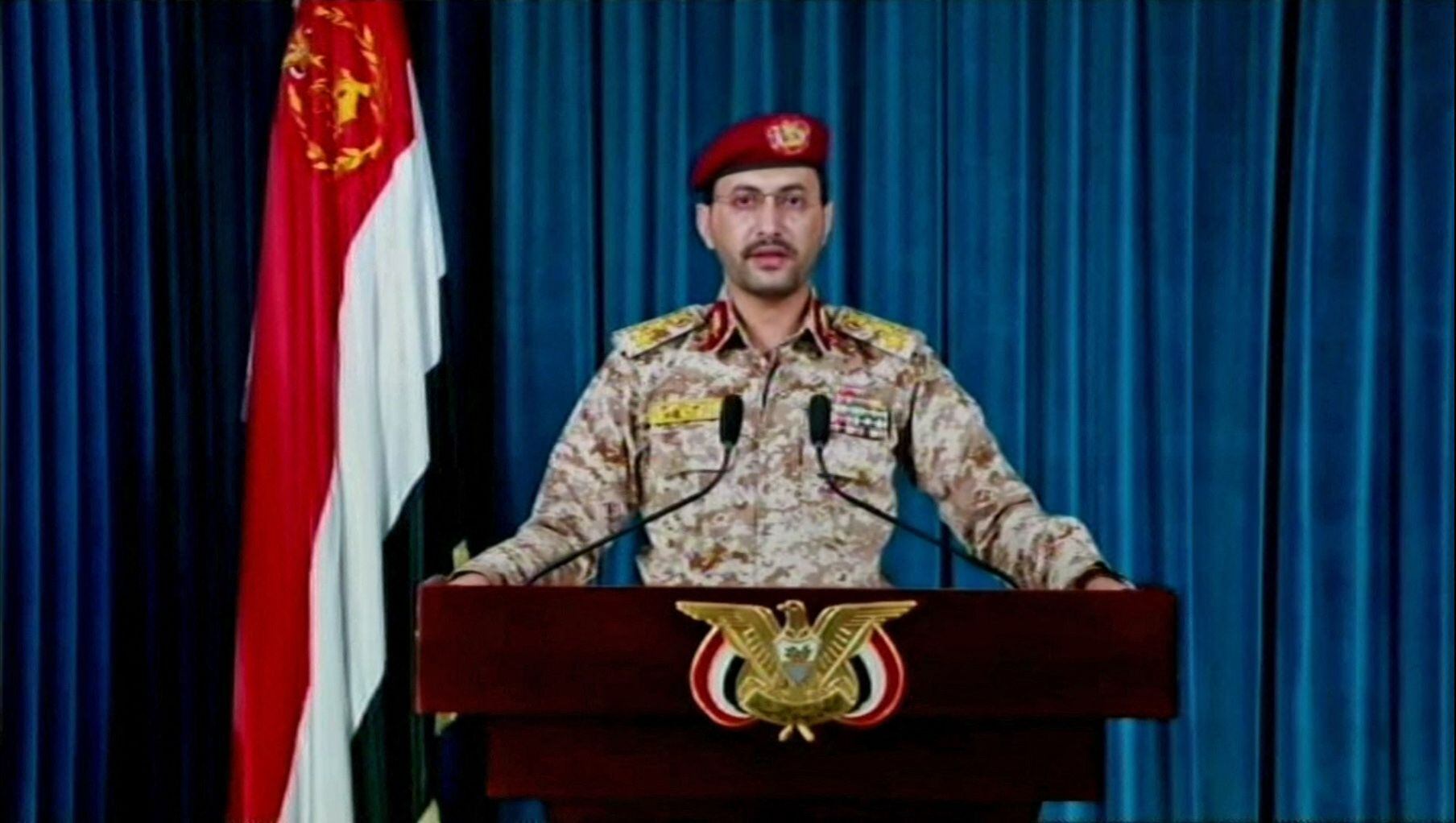 An image taken from a video shows Houthi military spokesman Brigadier General Yahya Saree giving a televised speech on January 17, 2022. (AFP).