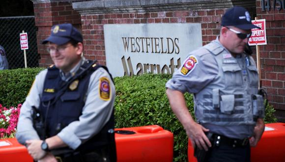 El hotel Marriott donde se lleva a cabo la reunión en Virginia (EE.UU.) permanece custodiado por la policía. (Foto: AFP)