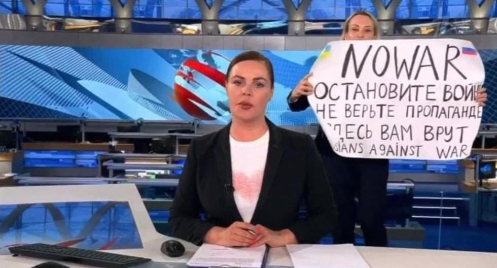 Russian journalist arrested for displaying anti-war banner on TV