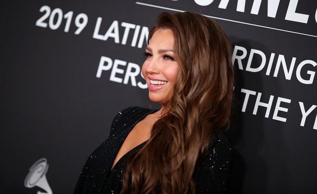 Thalía asistió a los 'Latyn Grammy Awards' en honor al cantante colombiano Juanes. A su paso lució espectacular con un vestido brillante en tono negro. Recorre la galería y conoce su look completo. (Foto: AFP)