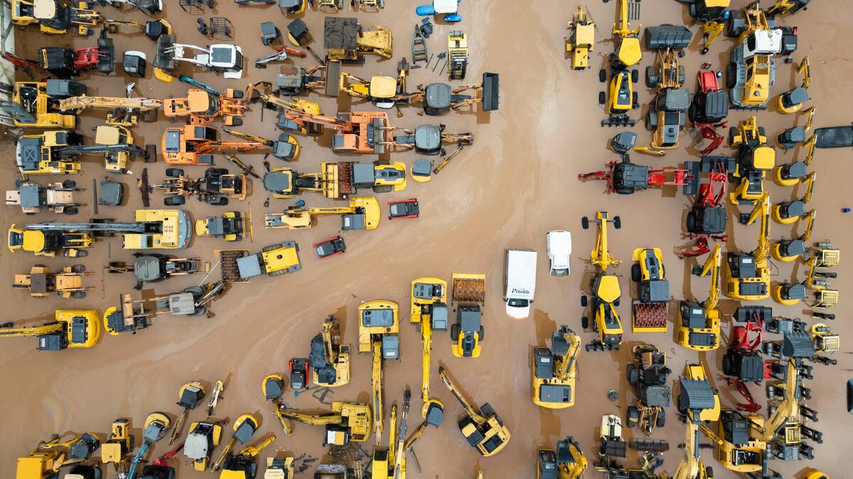 Aerial photograph taken with a drone showing a flooded area with vehicles, on May 5, 2024, after the flooding of Lake Guaíba, in the city of Porto Alegre, Brazil.  (Photo by Isaac Fontana/EFE)