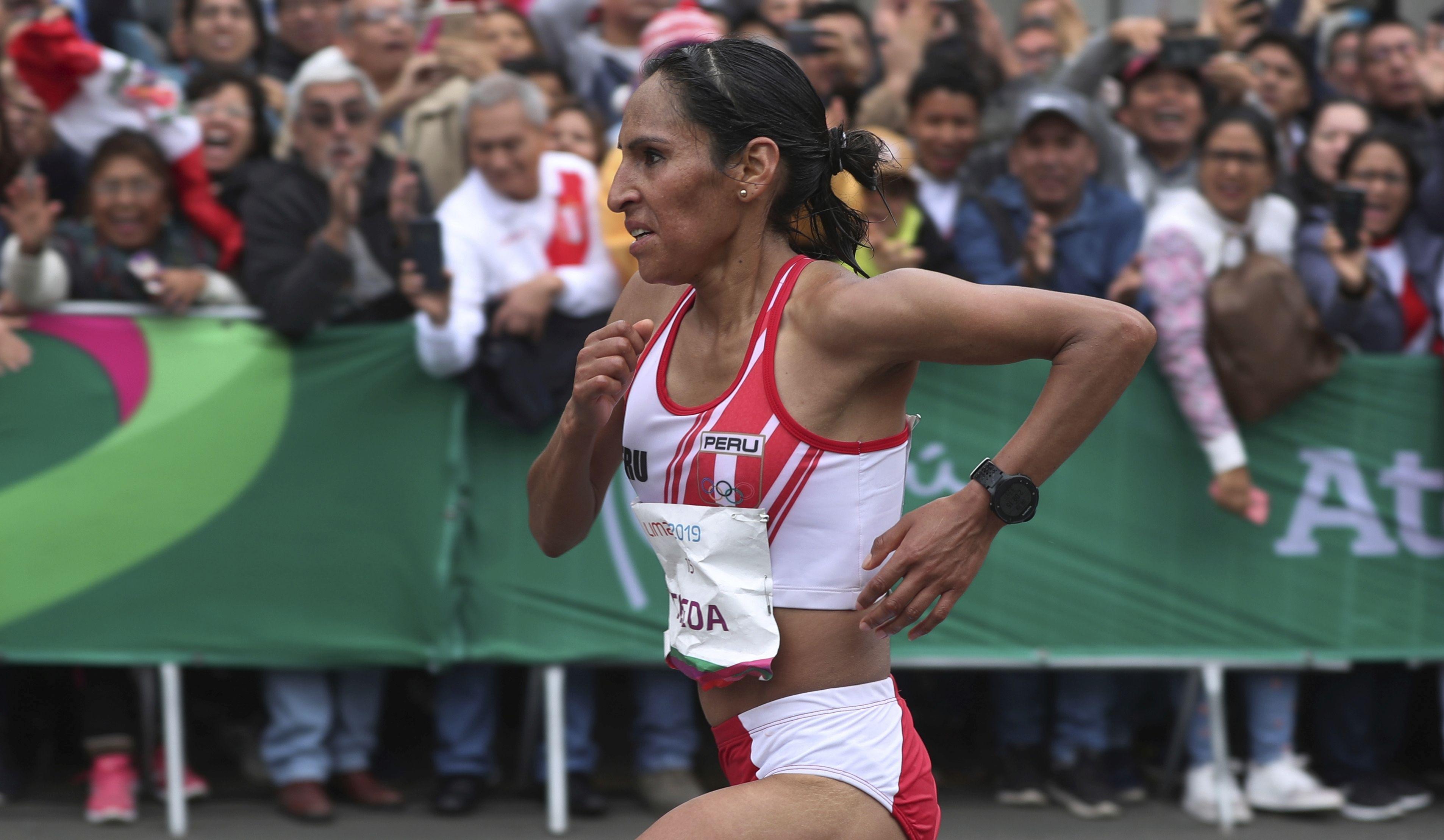 Gladys Tejeda of Peru competes in the women's marathon at the Pan American Games in Lima, Peru, Saturday, July 27, 2019. (AP Photo/Martin Mejia)