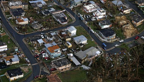 El martes, Donald Trump visitó la zona para constatar la magnitud del desastre. El gobernador Roseeló asegura haberle insistido en la importancia que tiene para la recuperación de la isla el restablecimiento de la energía eléctrica. (AP)