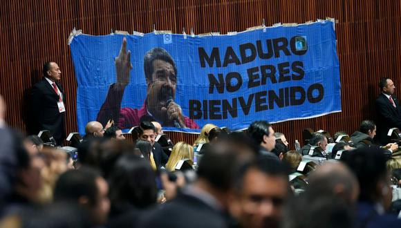 AMLO | "Dictador, dictador": Nicolás Maduro es abucheado durante discurso de nuevo presidente de México | VIDEO. (AFP)