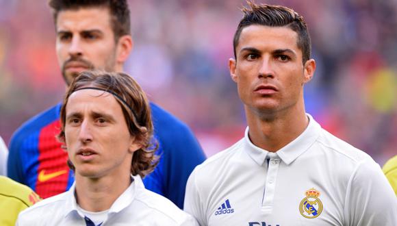 El agente de Cristiano Ronaldo, Jorge Mendes, expresó su molestia contra la UEFA por elegir a Luka Modric como mejor jugador de la última temporada en lugar de su representado. (Foto: AFP)