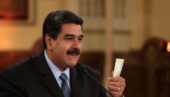 Según la reforma de Maduro, en septiembre cada trabajador pasará a ganar 1.800 bolívares soberanos, el equivalente de 180 millones de bolívares actuales. (AFP)