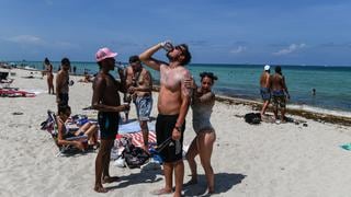 Coronavirus: con "embajadores de distancia social” y mascarillas, abrieron playas de Miami | FOTOS
