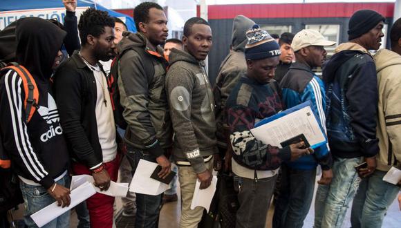 Al menos 180 haitianos retornarán voluntariamente a su país desde Chile. (AFP)