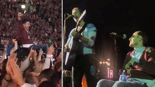 Fan de Coldplay en silla de ruedas subió a tocar junto a Chris Martin [VIDEO]