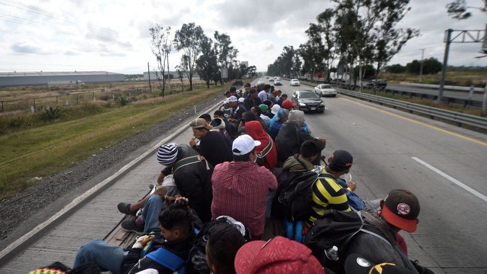 Migrants travel in trucks even through Central America and Mexico.