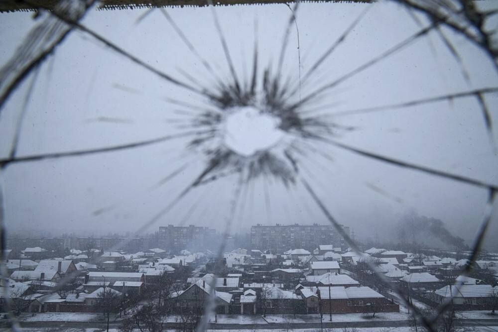 A hospital window glass is shattered by shelling in Mariupol, Ukraine, Thursday, March 3, 2022. (AP Photo/Evgeniy Maloletka)