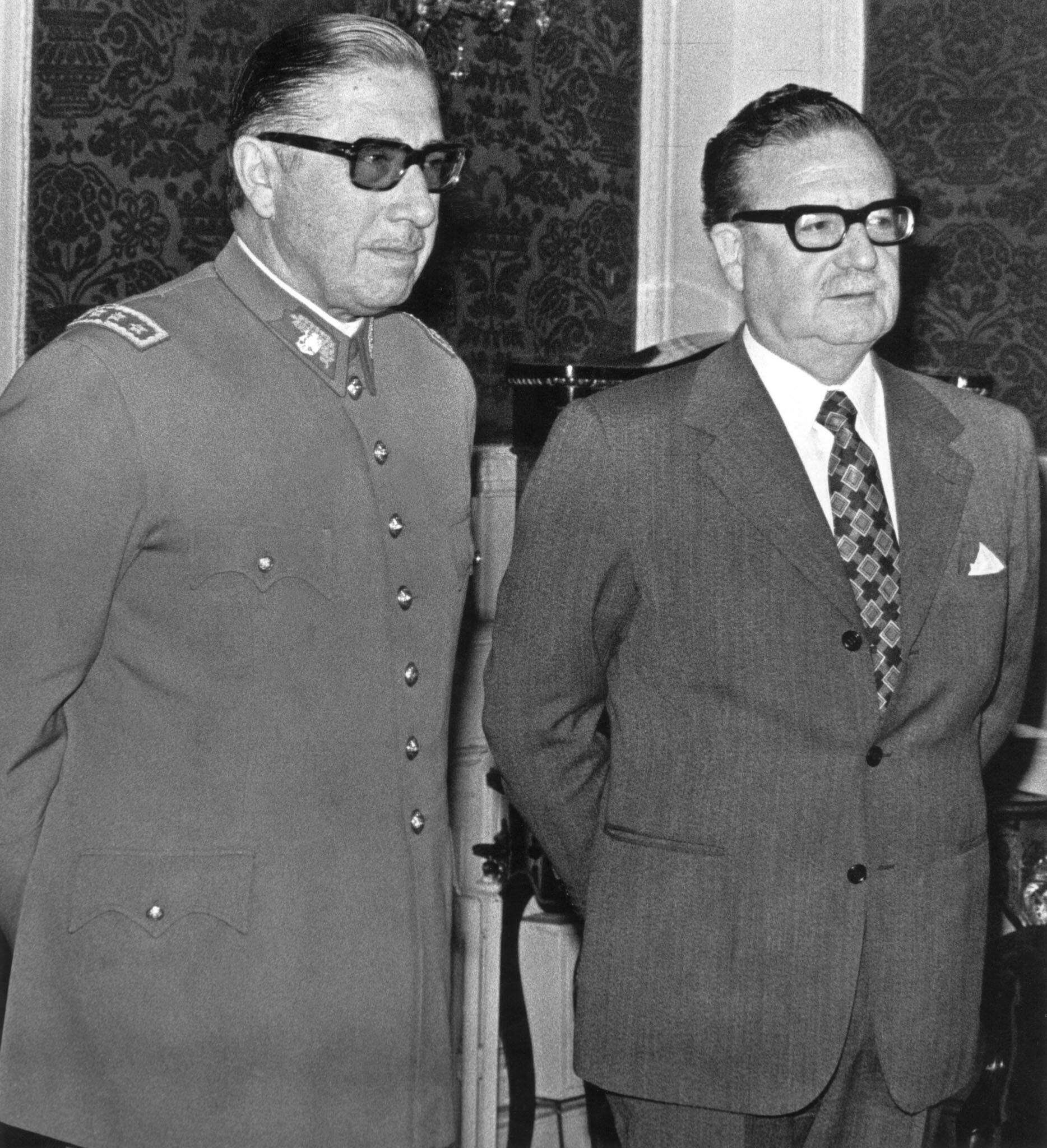 General Augusto Pinochet (left) poses with Chilean President Salvador Allende on August 23, 1973 in Santiago, shortly after Allende named him head of the army.  (AFP PHOTO/FILES).
