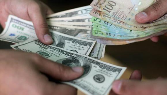 El precio del dólar Venezuela abrió a la baja según información del portal DolarToday. (Foto: AFP)