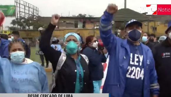 Trabajadores CAS COVID exigen que se firme autógrafa de ley que habilita el “pase automático del personal CAS COVID a CAS regular”.(Captura: TV Perú)