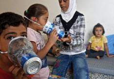 Sirios fabrican máscaras para proteger a sus hijos de ataques químicos | FOTOS
