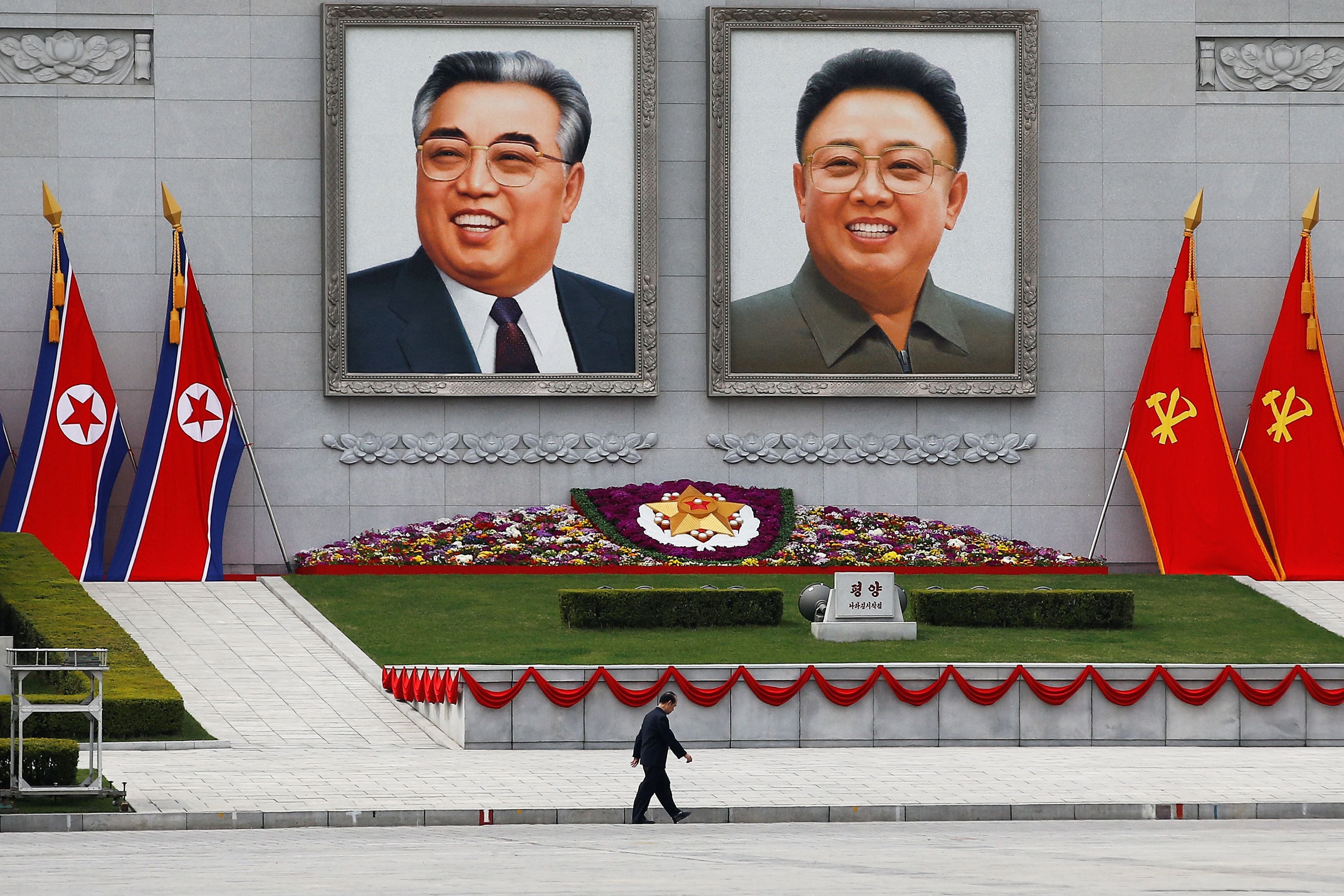 In the center of Pyongyang are the huge portraits of the country's founder, Kim Il-sung, and his son Kim Jong-il.  REUTERS/Damir Sagolj