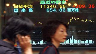 Bolsas de Asia cierran mixtas gracias a repunte en Wall Street