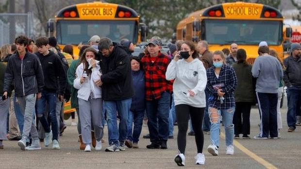 Students from the school were evacuated after the shooting.  (REUTERS)