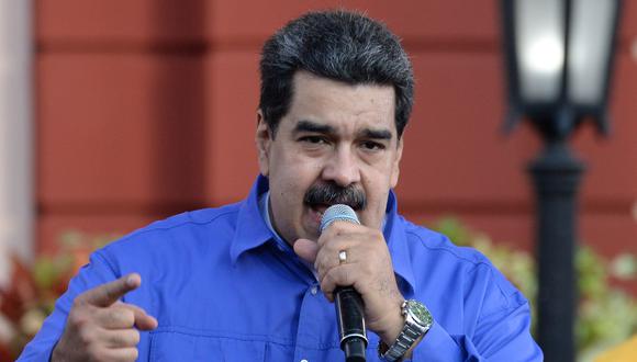 Nicolás Maduro señaló que Juan Guaidó protagonizó la "madre de todos los escándalos" por fotos donde aparece junto a presuntos miembros de banda criminal. (Foto: AFP)